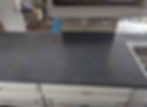 Dark gray kitchen countertop, resurfacing work