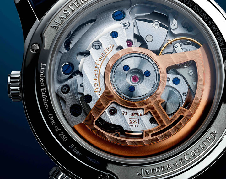 A close up of a watch on a blue background