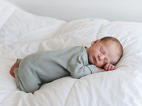 cute-caucasian-several-days-old-newborn-sleeping