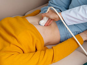 doctor-examing-left-lobe-of-liver-at-patient