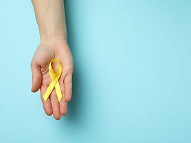 female-hand-hold-child-cancer-awareness