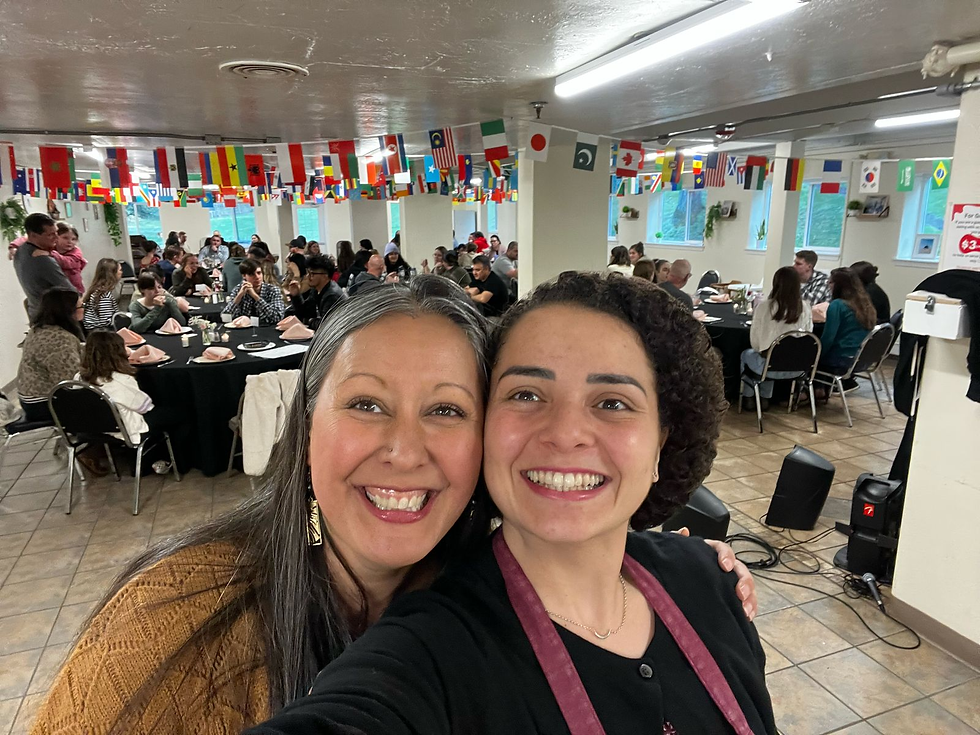 Stephanie and me celebrating the accomplishment of the welcome dinner! :)