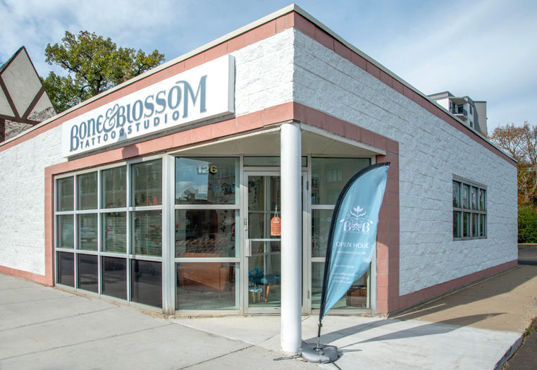 and extiror shot of Bone & Blossom Tattoo studio a female owned all female inclusive tattoo shop in Lombard IL