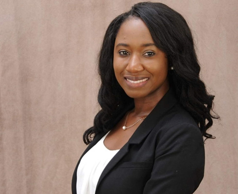 Editorial Board member smiling in professional attire