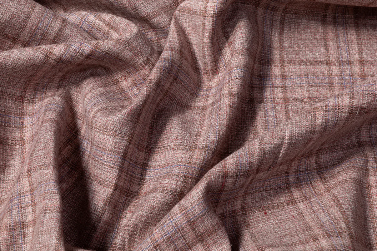 A mauve and brown plaid wool suiting fabric available for a custom hunt coat