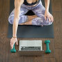 Young woman on yoga mat taking exercise class.jpg