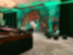 envents-corporate-event-casino-themed-event-green-black-red-decor-only-black-leather-furniture-white