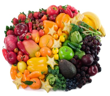 Heart-shaped pile of colorful fruits and vegetables on a white background, with berries, citrus, peppers, and broccoli.