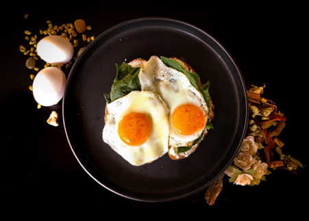 two fried eggs in a pan