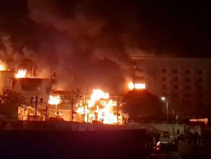 At least 19 dead in the blaze on the Thai border in Cambodia casino fire