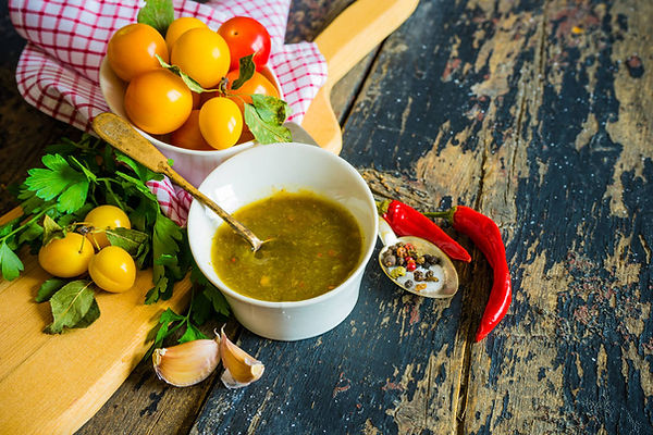 Fresh Georgian fruit sauce with tomatoes, herbs, garlic 
and chili pepper, natural ingredients, August Fruit Factory