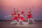 A group of ballet dancers on stage