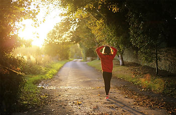 Woman walking on a path outdoors