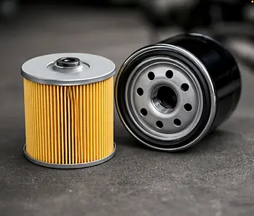 New and used oil filters before replacement during oil change