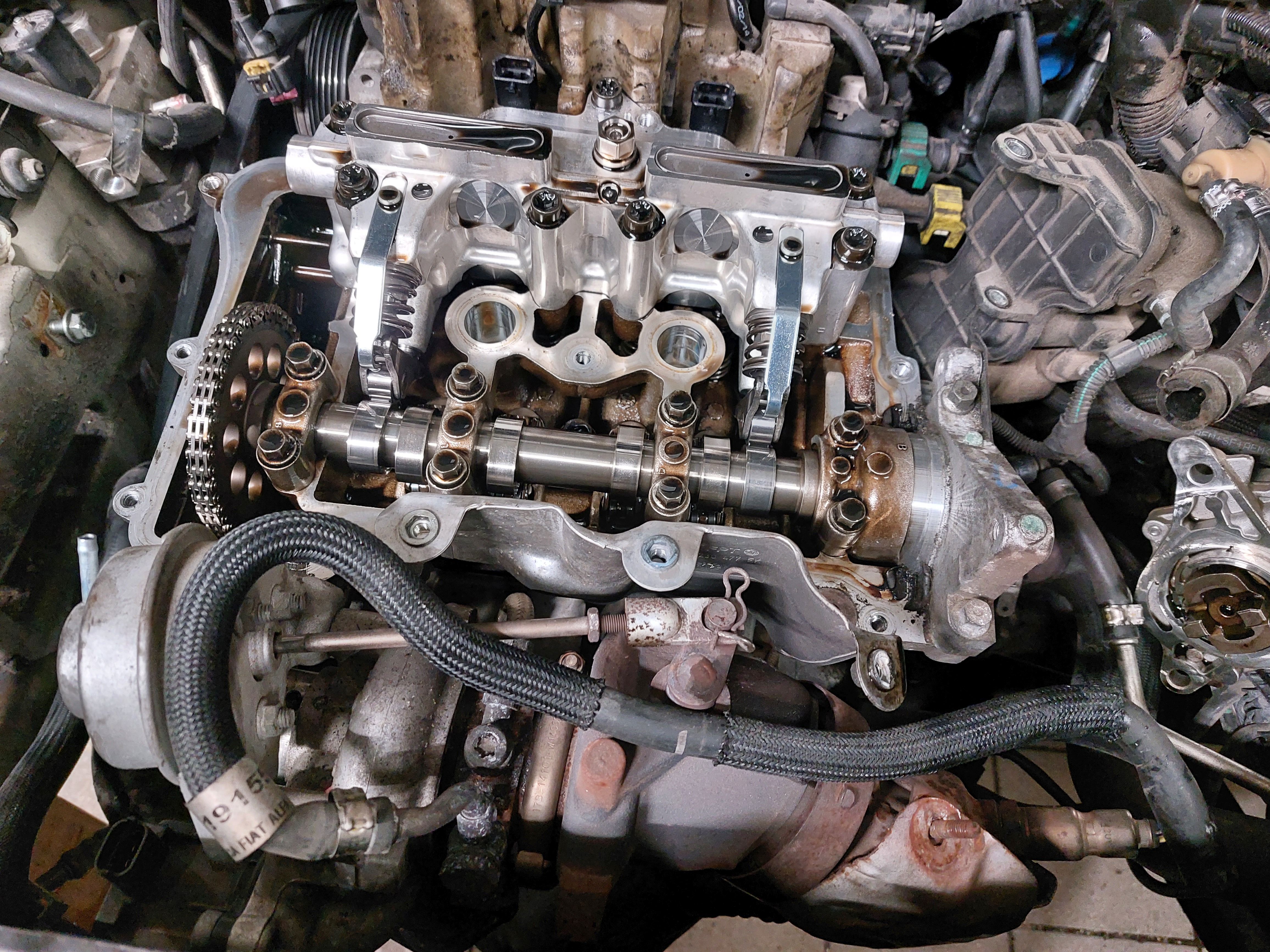 Real camshaft and timing chain in an engine cylinder head