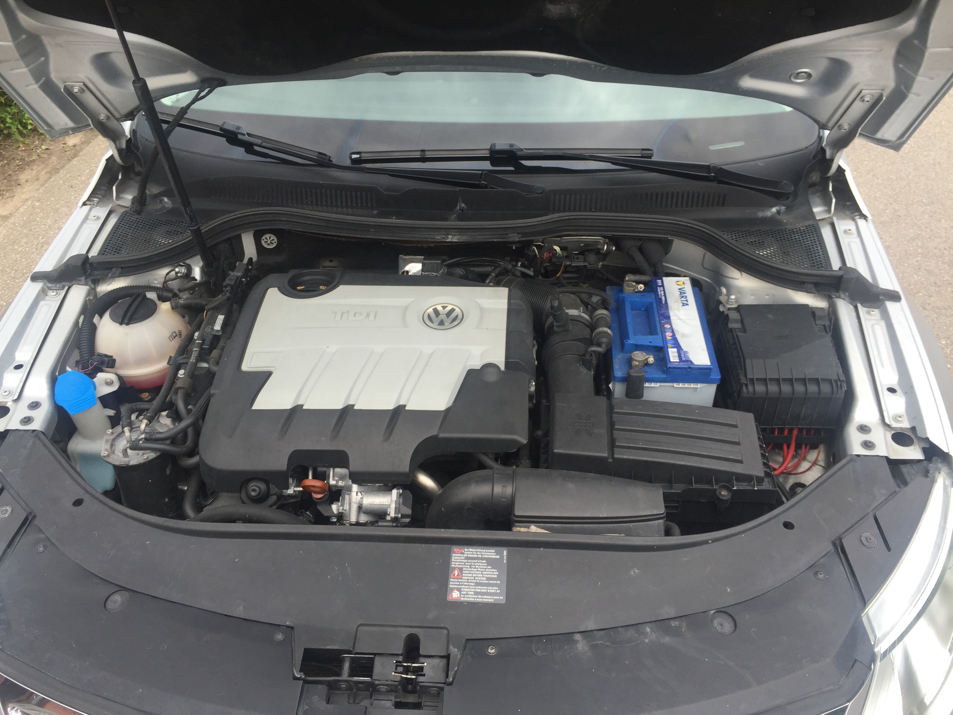 Genuine Volkswagen Passat CC 2.0 TDI engine bay photograph; diesel engine with timing belt is different from VW TSI gasoline engines