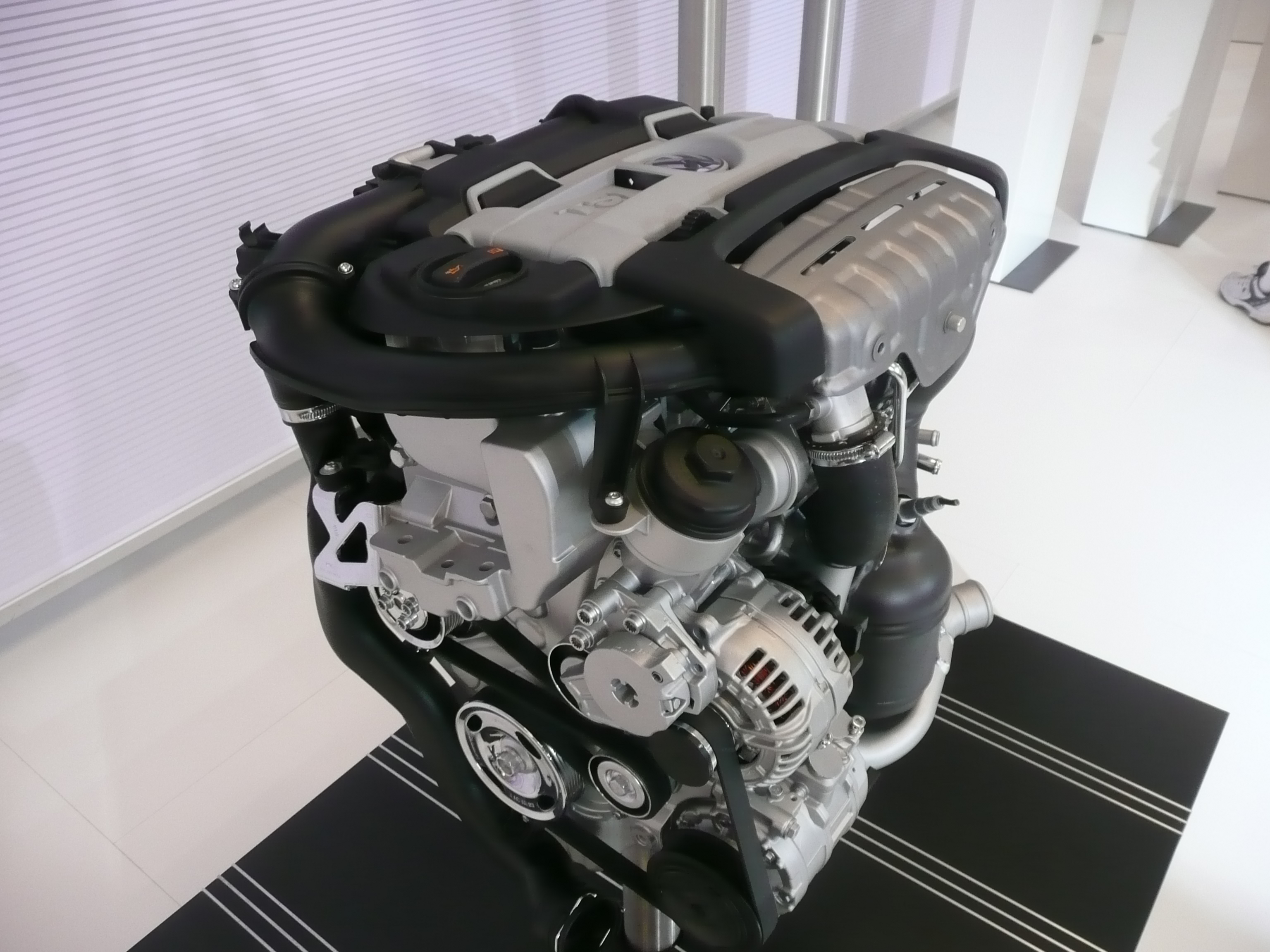 Photograph of a Volkswagen TSI engine, illustrative of VW TSI service; versions vary