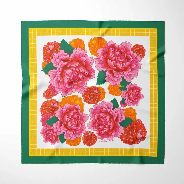 Vibrant floral silk scarf with bright pink and orange blossoms and squares.