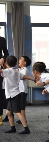 Philip J. Oosthuizen creativephilipj teaching a grade 2 class at NKCS