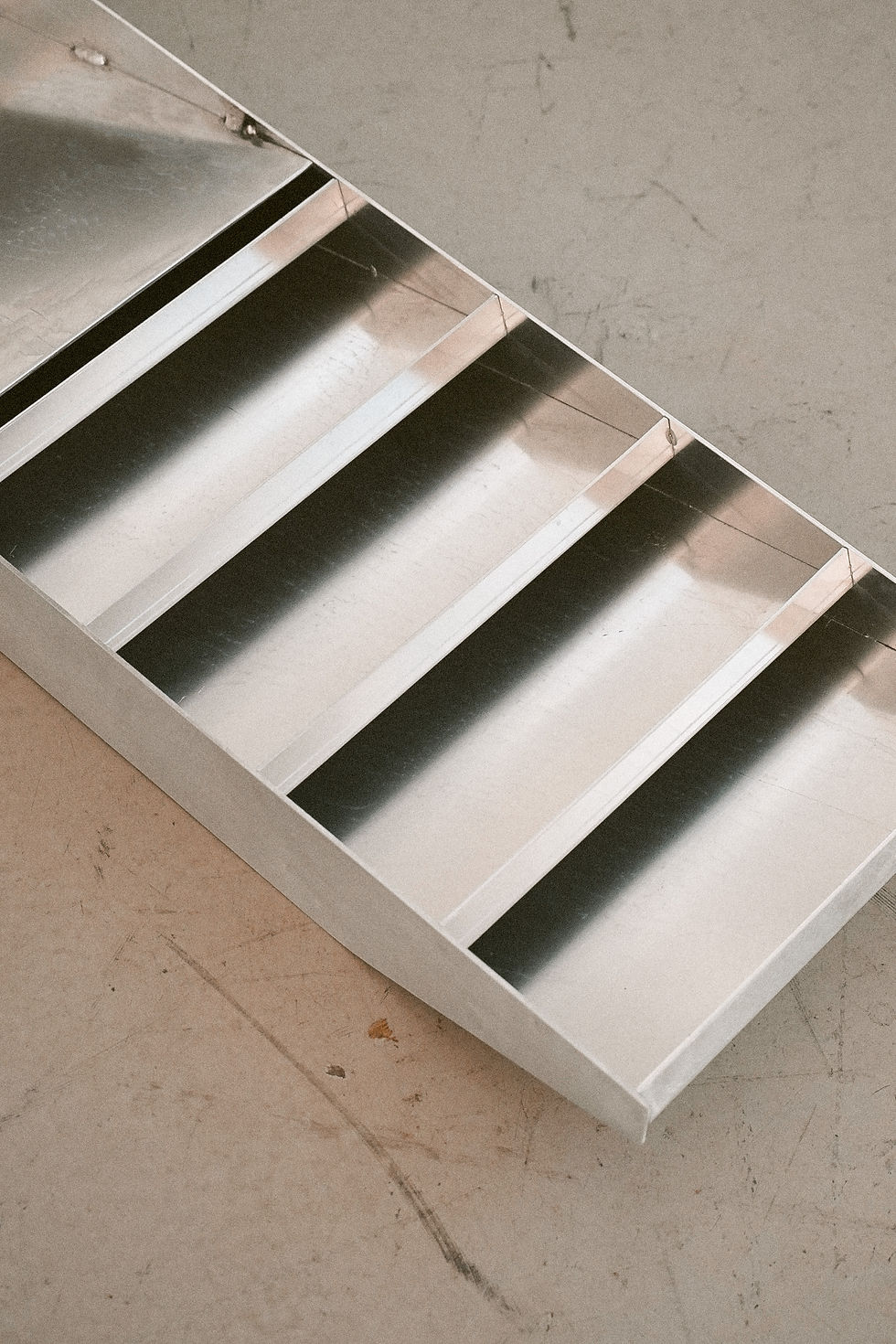 Thumbnail: Wall Mounted Magazine Rack in Rough Polished Aluminum