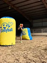 person standing behind gellyball bunker in game play
