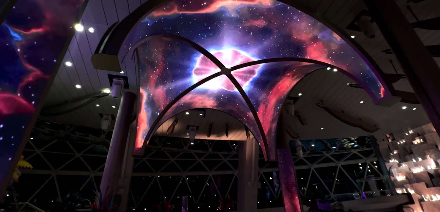 Candlelight is a media architecture piece created with 5D Scenic for The Bazaar (Celebrity Xcel). Instead of narrating, it uses digital light as an atmosphere to model the space and subtly backdrop gatherings. Along with Tunnel and Chamber, it serves as a silent visual companion for live music shows.