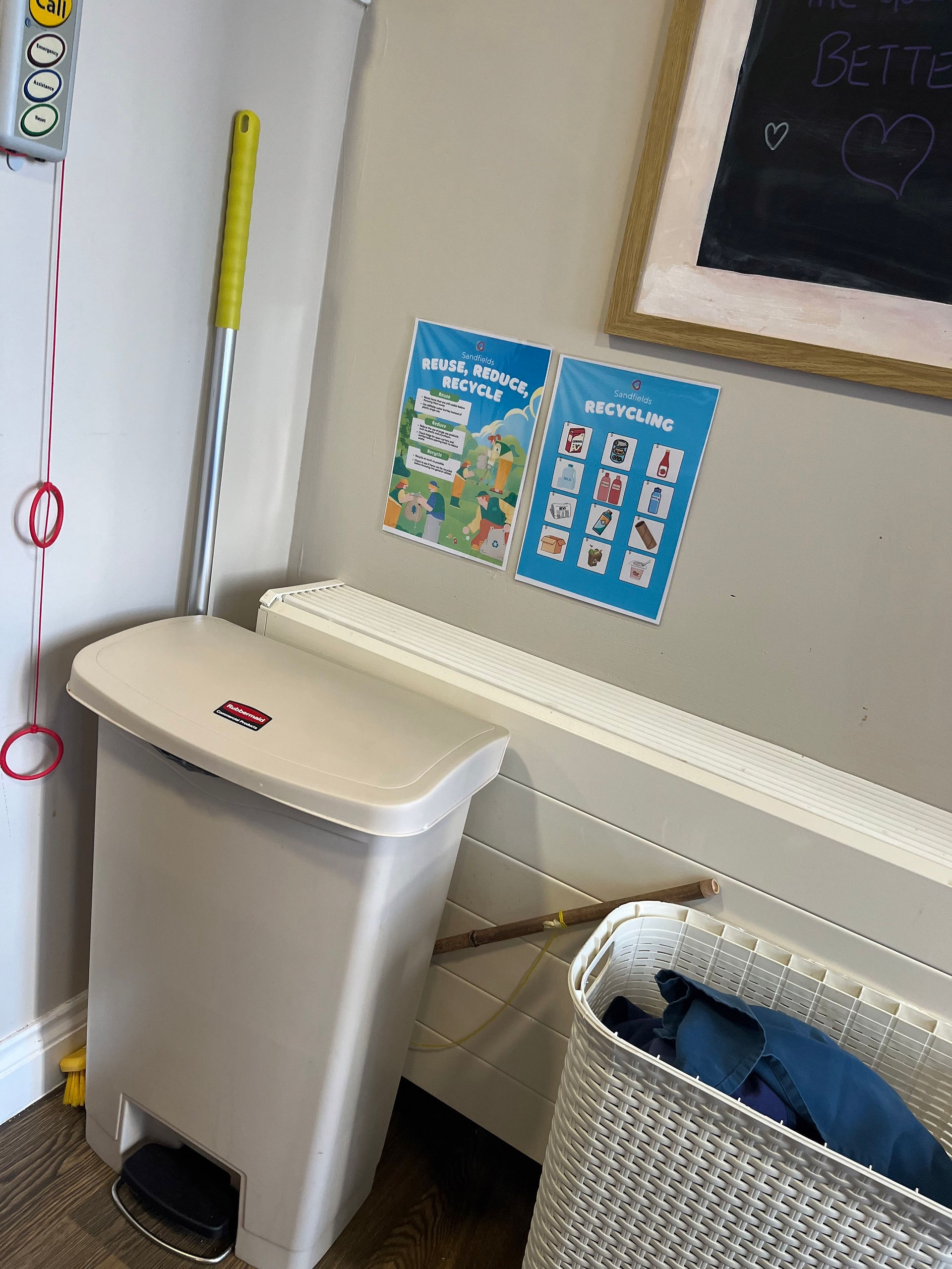 recycling posters by the bins