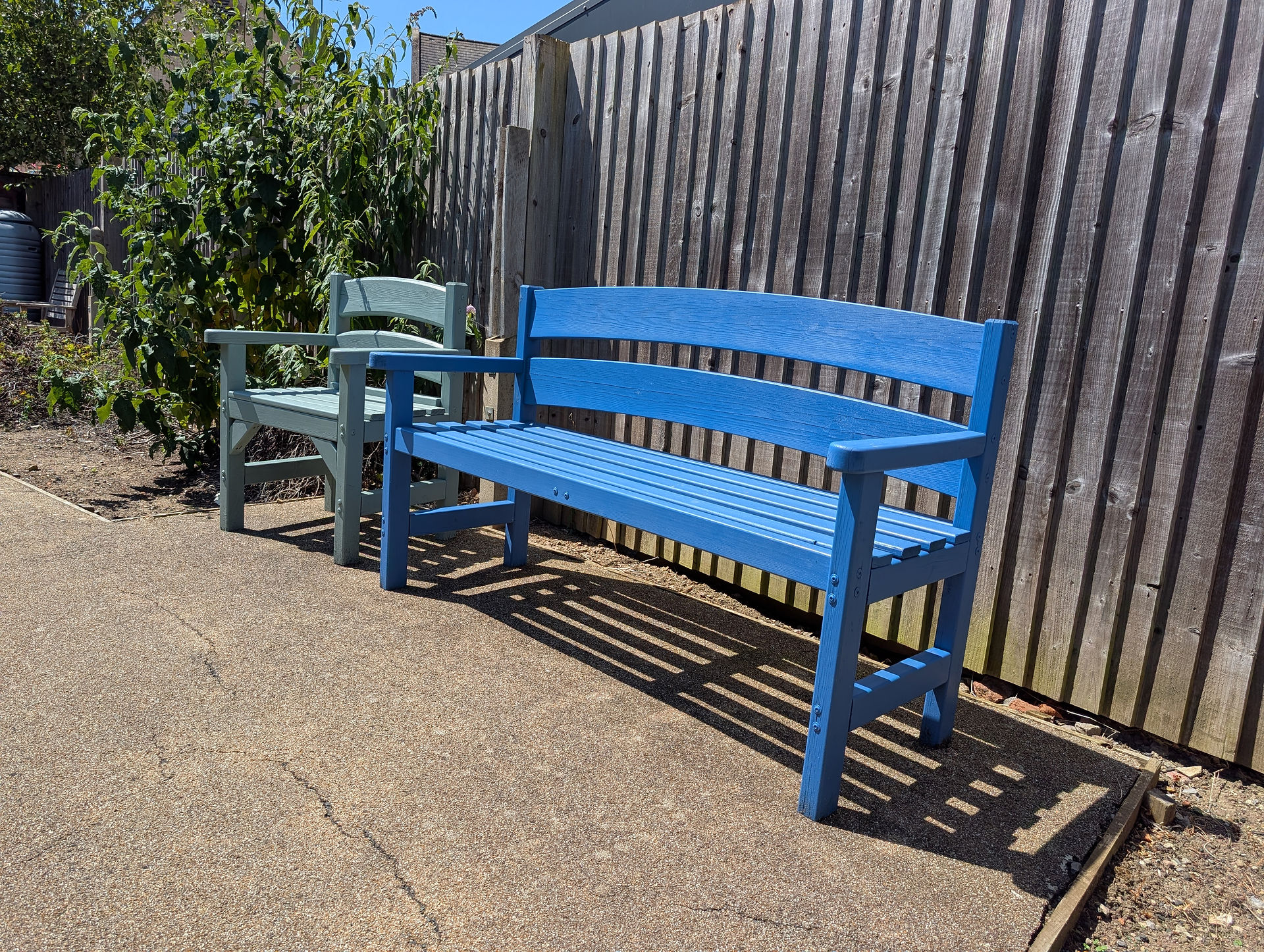 Blue bench in garden