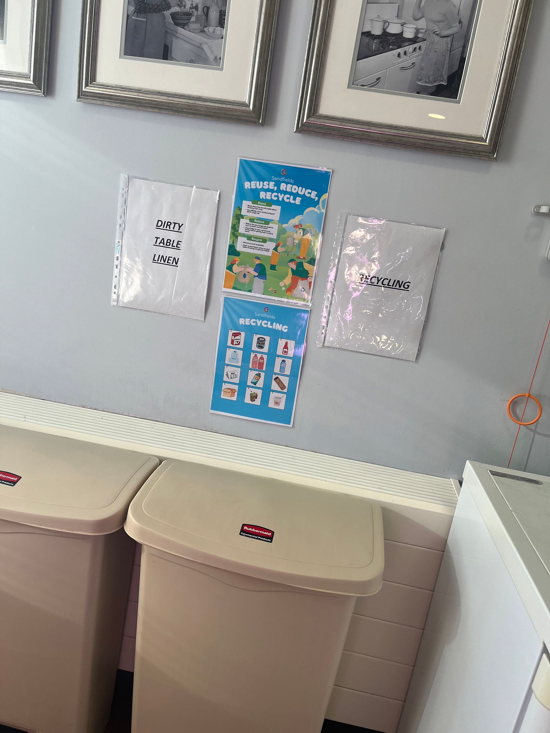 recycling posters by the bins