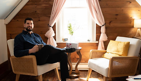 Therapist in a cozy office for Grief Therapy Ontario.