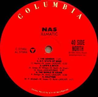 A close-up of the vibrant red Columbia Records center label on Side A of Nas's 'Illmatic' vinyl record. The word 'COLUMBIA' is printed in a semi-circle at the top in yellow uppercase letters, while the album title, tracklist for '40 Side North', and credits are printed in bold black typography around the center spindle hole.