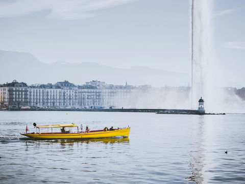 A Mouette boat in front of the Geneva Fountain
