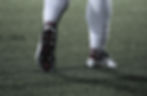 Football player feet on the field | Sam Gash