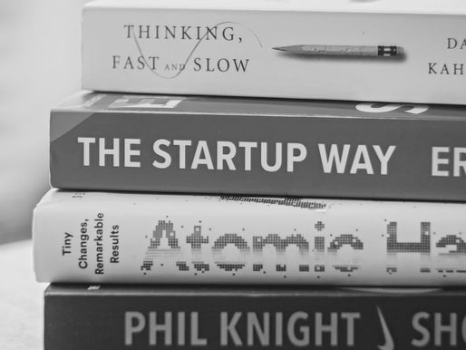 A pile of books about startup strategy | Ultrabrand