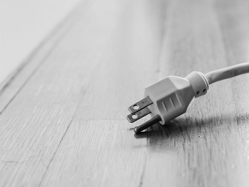 Unplugged power outlet on the floor | Ultrabrand