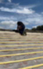 man installing a new roof