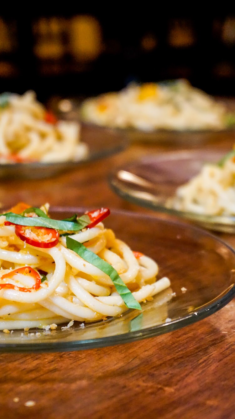 Italian pasta with fresh tomato and basil paired perfectly at this company's Italian-themed interact