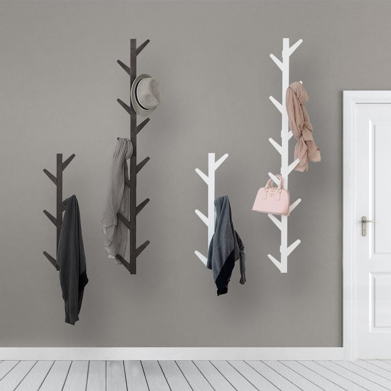 wall hung coat rack in hallway, layout consideration for hallway. home interior designing by lakkad works