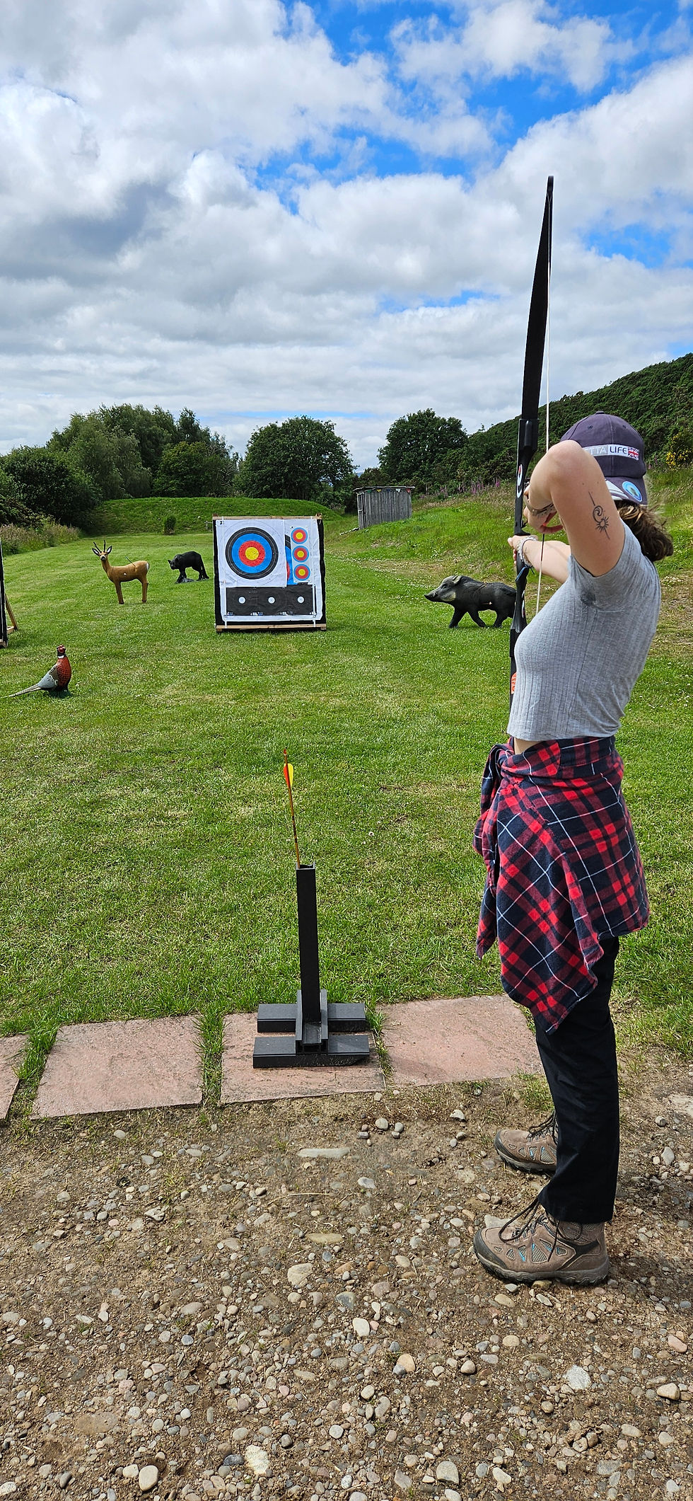 Left handed archery in action