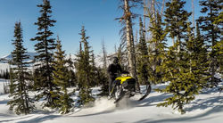 snowmobile mountain trail