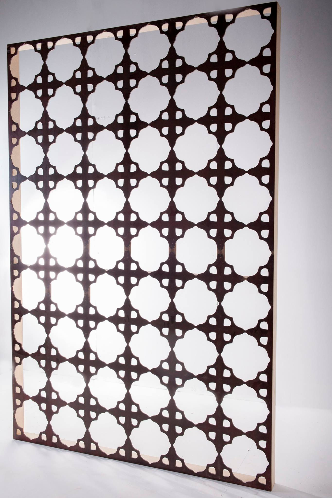 Laser cut dark wood pannel