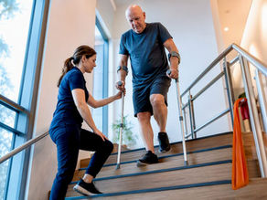 Patient practising stairs after hip replacement
