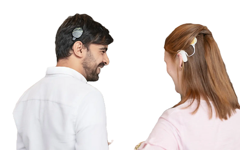 Man wearing cochlear implant magnetic processor next to a woman wearing an over-the-ear cochlear implant processor w/magnetic attachment.