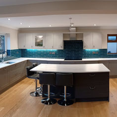 vivid peacock blue tiles in large kitchen