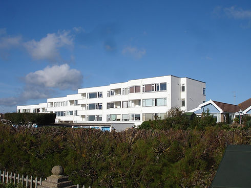 early 20th century style block of white seaside flats