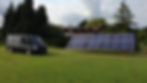 A1 Contracting liveried van parked beside a solar panel array in a large garden