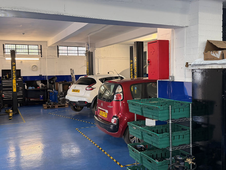 cars waiting to be be worked on