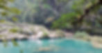 Semuc Chapmey, Guatemala. Tranquil blue lagoon on a sunny day
