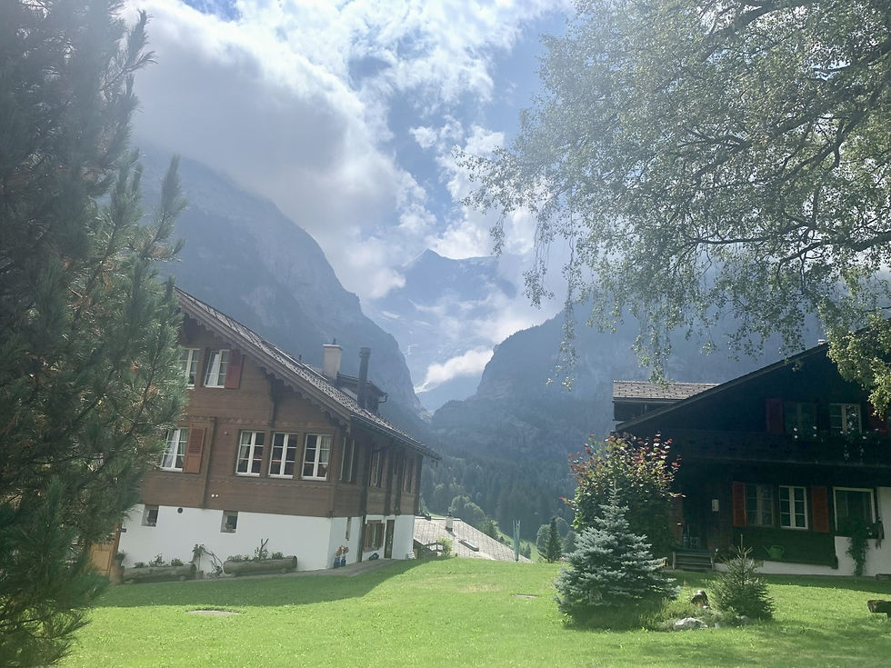 Sun creeping through the clouds whilst walking through Grindelwald