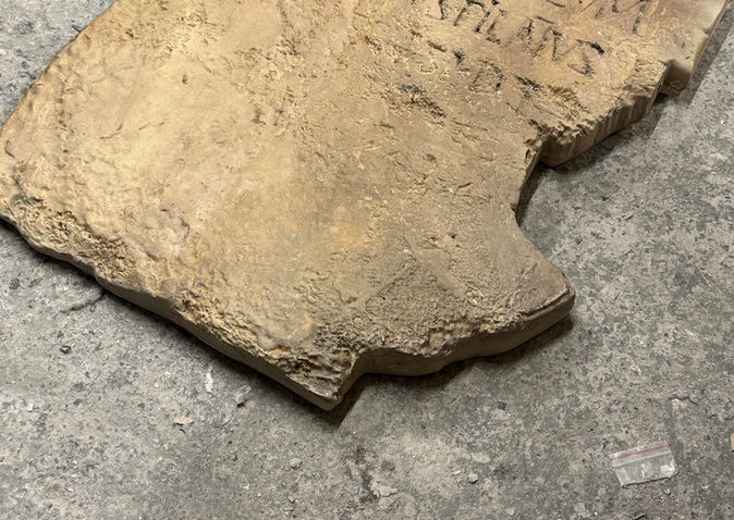 Life-size Pilate Stone replica displaying the historic Roman inscription with realistic weathered stone appearance.